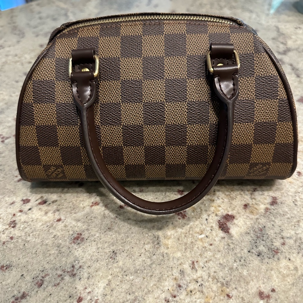 NWOT; Never used; Pristine condition; LOUIS VUITTON MINI RIBERA IN DAMIER EBENE